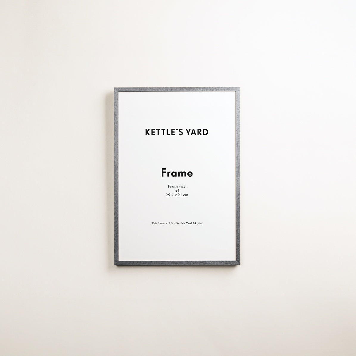 A solid wood picture frame with a matt painted finish, labeled 'Kettle's Yard Frame' and indicating it is an A4 size frame.